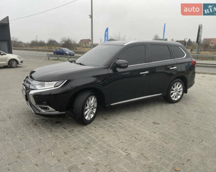 Чорний Міцубісі Аутлендер, об'ємом двигуна 2 л та пробігом 145 тис. км за 21200 $, фото 2 на Automoto.ua
