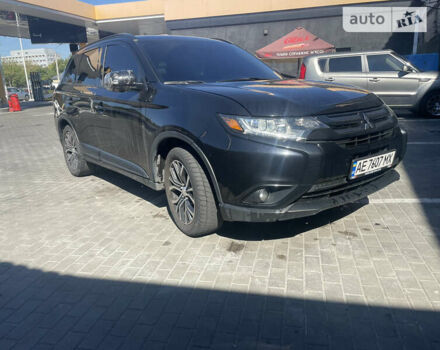 Черный Мицубиси Аутлендер, объемом двигателя 2.36 л и пробегом 190 тыс. км за 13500 $, фото 1 на Automoto.ua