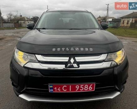 Черный Мицубиси Аутлендер, объемом двигателя 3 л и пробегом 99 тыс. км за 15980 $, фото 4 на Automoto.ua