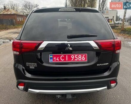 Черный Мицубиси Аутлендер, объемом двигателя 3 л и пробегом 99 тыс. км за 15980 $, фото 16 на Automoto.ua