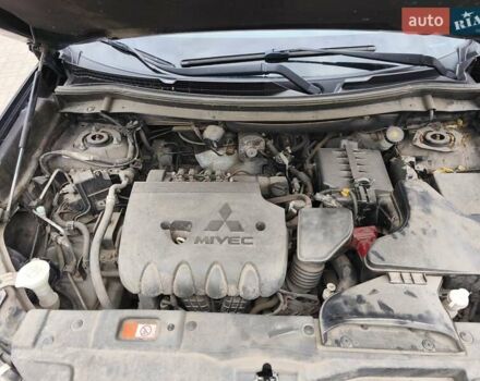 Черный Мицубиси Аутлендер, объемом двигателя 2.36 л и пробегом 162 тыс. км за 14450 $, фото 26 на Automoto.ua