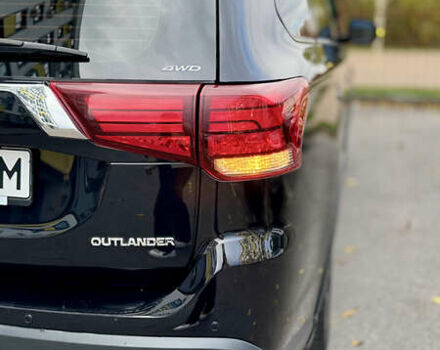 Чорний Міцубісі Аутлендер, об'ємом двигуна 2.36 л та пробігом 154 тис. км за 19500 $, фото 2 на Automoto.ua