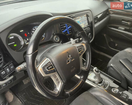 Чорний Міцубісі Аутлендер, об'ємом двигуна 2 л та пробігом 145 тис. км за 21200 $, фото 8 на Automoto.ua