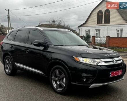 Черный Мицубиси Аутлендер, объемом двигателя 3 л и пробегом 99 тыс. км за 15980 $, фото 2 на Automoto.ua