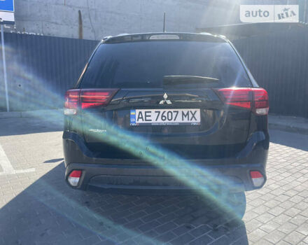 Черный Мицубиси Аутлендер, объемом двигателя 2.36 л и пробегом 190 тыс. км за 13500 $, фото 3 на Automoto.ua