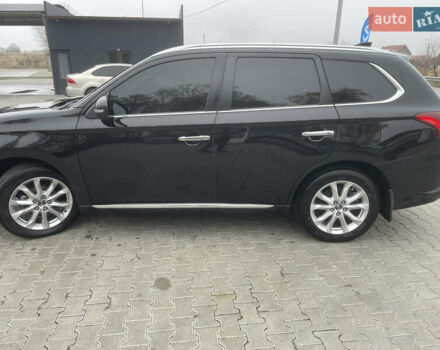 Чорний Міцубісі Аутлендер, об'ємом двигуна 2 л та пробігом 145 тис. км за 21200 $, фото 3 на Automoto.ua