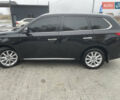 Чорний Міцубісі Аутлендер, об'ємом двигуна 2 л та пробігом 145 тис. км за 21200 $, фото 3 на Automoto.ua