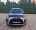Черный Мицубиси Аутлендер, объемом двигателя 2.36 л и пробегом 168 тыс. км за 14999 $, фото 4 на Automoto.ua