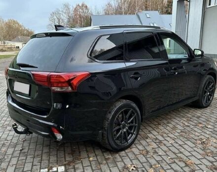 Чорний Міцубісі Аутлендер, об'ємом двигуна 0 л та пробігом 135 тис. км за 8600 $, фото 1 на Automoto.ua