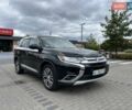 Черный Мицубиси Аутлендер, объемом двигателя 2.36 л и пробегом 122 тыс. км за 15400 $, фото 2 на Automoto.ua