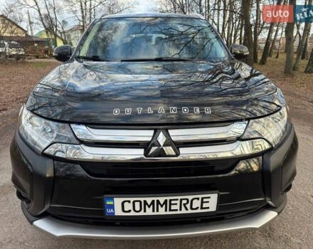 Черный Мицубиси Аутлендер, объемом двигателя 3 л и пробегом 99 тыс. км за 15800 $, фото 7 на Automoto.ua