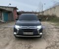 Черный Мицубиси Аутлендер, объемом двигателя 2.4 л и пробегом 185 тыс. км за 14300 $, фото 1 на Automoto.ua