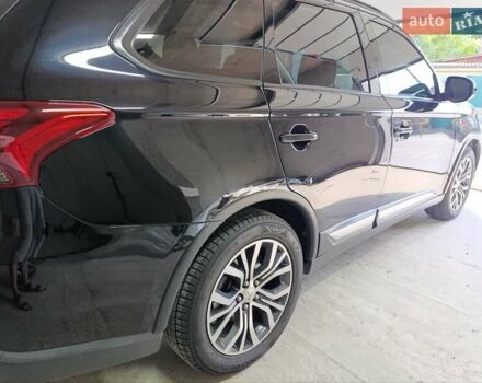 Черный Мицубиси Аутлендер, объемом двигателя 2.36 л и пробегом 120 тыс. км за 16900 $, фото 12 на Automoto.ua