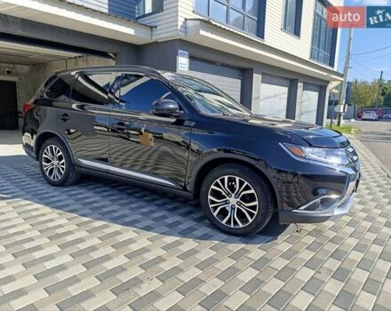 Черный Мицубиси Аутлендер, объемом двигателя 2.36 л и пробегом 120 тыс. км за 16900 $, фото 6 на Automoto.ua