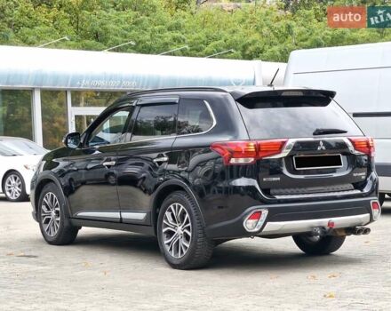 Черный Мицубиси Аутлендер, объемом двигателя 2.36 л и пробегом 162 тыс. км за 14450 $, фото 6 на Automoto.ua