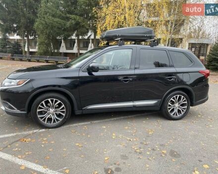 Чорний Міцубісі Аутлендер, об'ємом двигуна 2.36 л та пробігом 192 тис. км за 14200 $, фото 1 на Automoto.ua