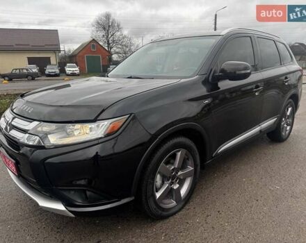 Черный Мицубиси Аутлендер, объемом двигателя 3 л и пробегом 99 тыс. км за 15980 $, фото 6 на Automoto.ua