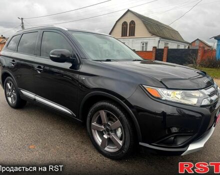 Чорний Міцубісі Аутлендер, об'ємом двигуна 3 л та пробігом 99 тис. км за 15998 $, фото 4 на Automoto.ua