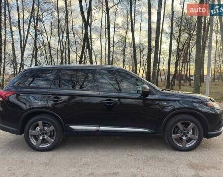 Черный Мицубиси Аутлендер, объемом двигателя 3 л и пробегом 99 тыс. км за 15800 $, фото 12 на Automoto.ua