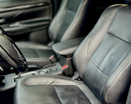 Чорний Міцубісі Аутлендер, об'ємом двигуна 2.36 л та пробігом 154 тис. км за 19500 $, фото 18 на Automoto.ua