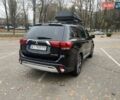Чорний Міцубісі Аутлендер, об'ємом двигуна 2.36 л та пробігом 192 тис. км за 14200 $, фото 5 на Automoto.ua