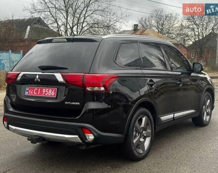 Черный Мицубиси Аутлендер, объемом двигателя 3 л и пробегом 99 тыс. км за 15980 $, фото 11 на Automoto.ua