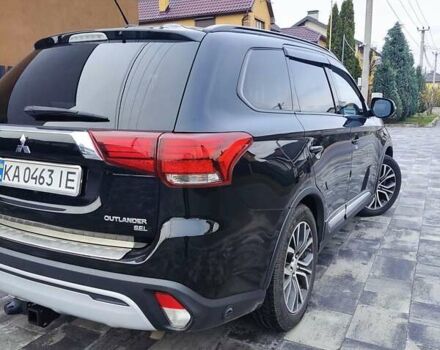 Чорний Міцубісі Аутлендер, об'ємом двигуна 2.36 л та пробігом 213 тис. км за 14500 $, фото 8 на Automoto.ua