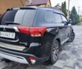 Чорний Міцубісі Аутлендер, об'ємом двигуна 2.36 л та пробігом 213 тис. км за 14500 $, фото 8 на Automoto.ua