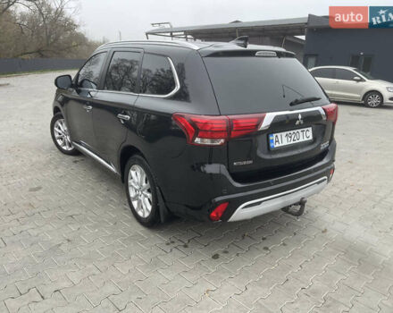 Чорний Міцубісі Аутлендер, об'ємом двигуна 2 л та пробігом 145 тис. км за 21200 $, фото 11 на Automoto.ua