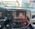 Черный Мицубиси Аутлендер, объемом двигателя 3 л и пробегом 105 тыс. км за 18200 $, фото 1 на Automoto.ua