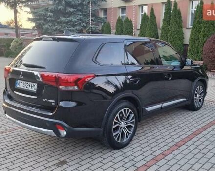Черный Мицубиси Аутлендер, объемом двигателя 2.36 л и пробегом 168 тыс. км за 14999 $, фото 3 на Automoto.ua