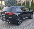 Черный Мицубиси Аутлендер, объемом двигателя 2.36 л и пробегом 168 тыс. км за 14999 $, фото 3 на Automoto.ua