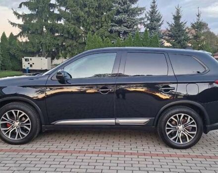 Черный Мицубиси Аутлендер, объемом двигателя 2.36 л и пробегом 168 тыс. км за 14999 $, фото 6 на Automoto.ua