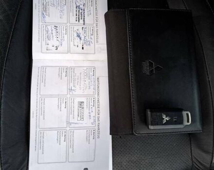 Чорний Міцубісі Аутлендер, об'ємом двигуна 0 л та пробігом 137 тис. км за 18699 $, фото 16 на Automoto.ua