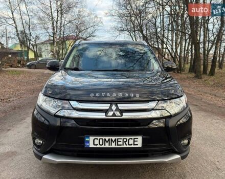 Черный Мицубиси Аутлендер, объемом двигателя 3 л и пробегом 99 тыс. км за 15800 $, фото 2 на Automoto.ua