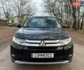 Черный Мицубиси Аутлендер, объемом двигателя 3 л и пробегом 99 тыс. км за 15800 $, фото 2 на Automoto.ua
