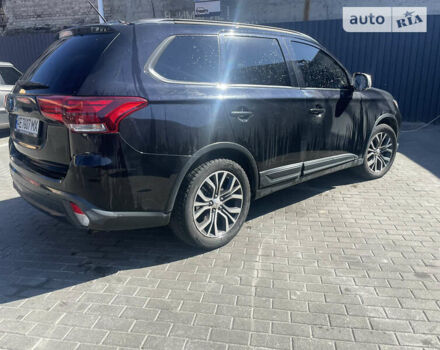 Черный Мицубиси Аутлендер, объемом двигателя 2.36 л и пробегом 190 тыс. км за 13500 $, фото 2 на Automoto.ua