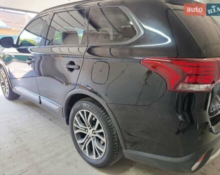 Черный Мицубиси Аутлендер, объемом двигателя 2.36 л и пробегом 120 тыс. км за 16900 $, фото 14 на Automoto.ua