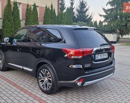 Черный Мицубиси Аутлендер, объемом двигателя 2.36 л и пробегом 168 тыс. км за 14999 $, фото 1 на Automoto.ua