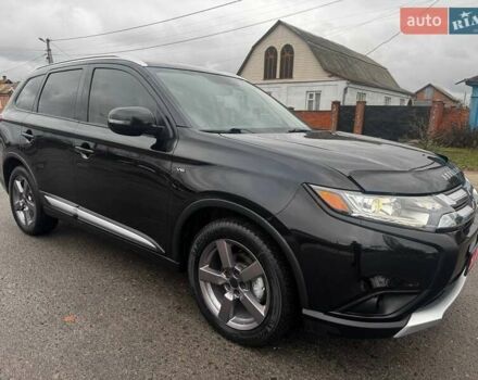 Черный Мицубиси Аутлендер, объемом двигателя 3 л и пробегом 99 тыс. км за 15980 $, фото 5 на Automoto.ua
