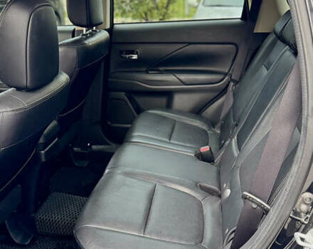 Чорний Міцубісі Аутлендер, об'ємом двигуна 2.36 л та пробігом 154 тис. км за 19500 $, фото 16 на Automoto.ua