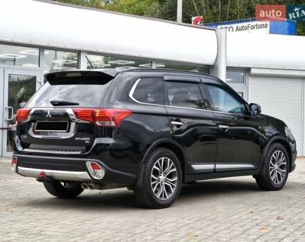 Черный Мицубиси Аутлендер, объемом двигателя 2.36 л и пробегом 162 тыс. км за 14450 $, фото 4 на Automoto.ua