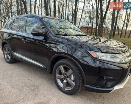 Черный Мицубиси Аутлендер, объемом двигателя 3 л и пробегом 99 тыс. км за 15800 $, фото 8 на Automoto.ua