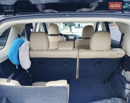 Чорний Міцубісі Аутлендер, об'ємом двигуна 2.36 л та пробігом 213 тис. км за 14500 $, фото 12 на Automoto.ua