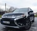 Чорний Міцубісі Аутлендер, об'ємом двигуна 2.36 л та пробігом 213 тис. км за 14500 $, фото 1 на Automoto.ua