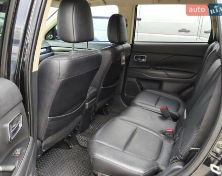 Черный Мицубиси Аутлендер, объемом двигателя 2.36 л и пробегом 162 тыс. км за 14450 $, фото 10 на Automoto.ua