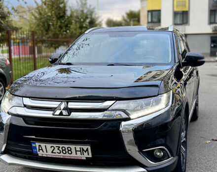 Чорний Міцубісі Аутлендер, об'ємом двигуна 2.36 л та пробігом 154 тис. км за 19500 $, фото 29 на Automoto.ua