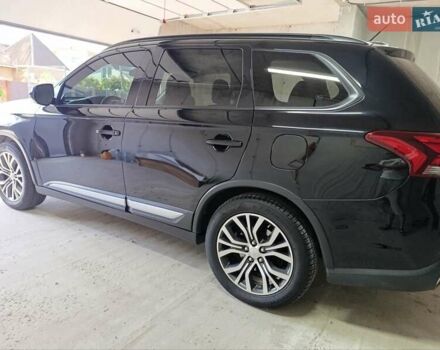 Черный Мицубиси Аутлендер, объемом двигателя 2.36 л и пробегом 120 тыс. км за 16900 $, фото 13 на Automoto.ua