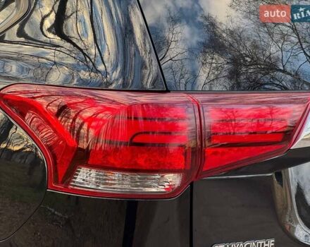 Черный Мицубиси Аутлендер, объемом двигателя 3 л и пробегом 99 тыс. км за 15800 $, фото 17 на Automoto.ua