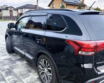 Чорний Міцубісі Аутлендер, об'ємом двигуна 2.36 л та пробігом 213 тис. км за 14500 $, фото 6 на Automoto.ua